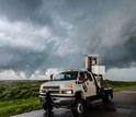 The scientists scan a possible tornado-producing supercell in Kansas at sunset.